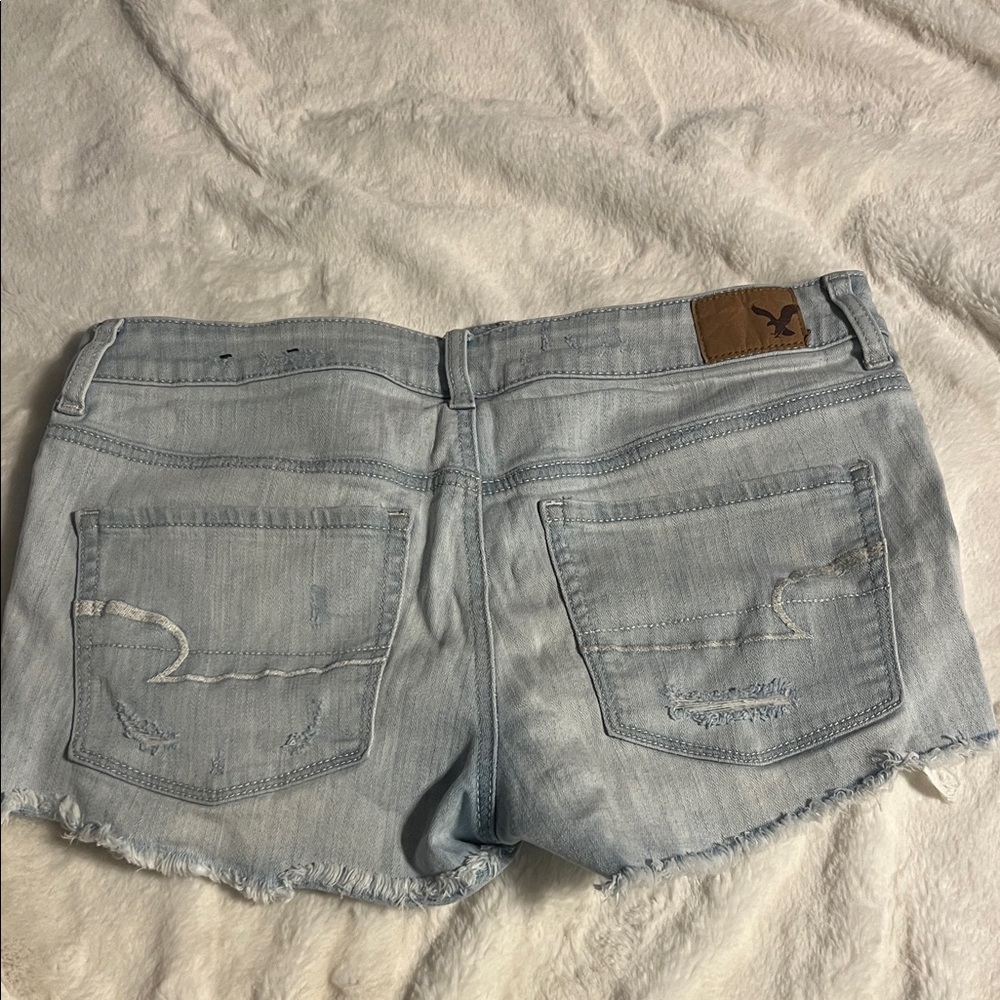American Eagle Outfitters Light Blue Ripped Jean Shorts - Picture 4 of 4
